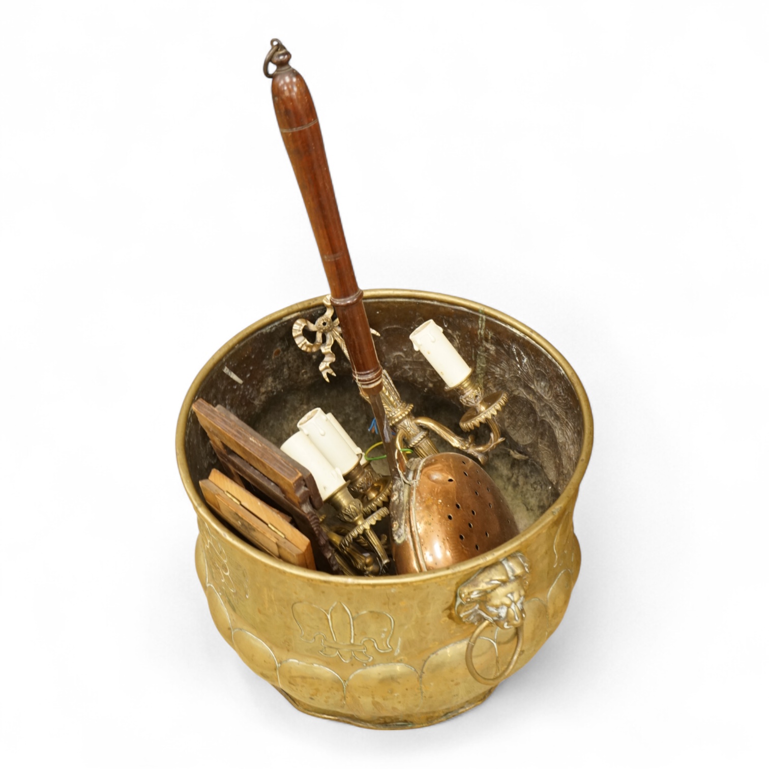A 19th century Dutch brass coal bin, a pair of wall sconces, a copper bed warmer and three book slides